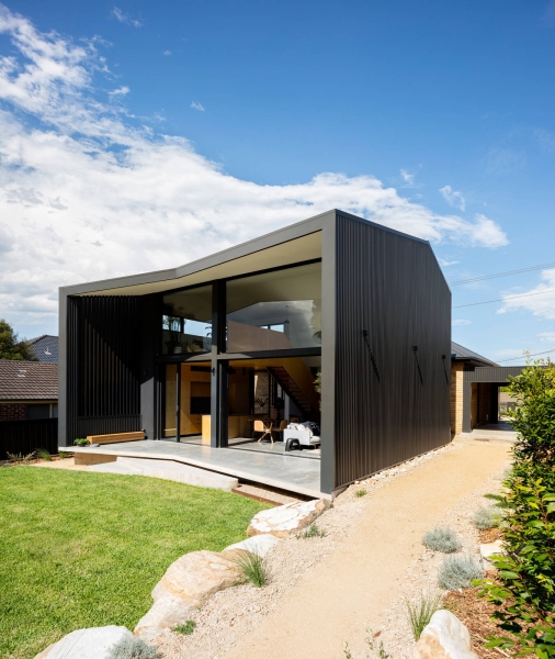 How a Black Metal Extension Turned a 1960s Brick House Into a Light-Filled Modern Home