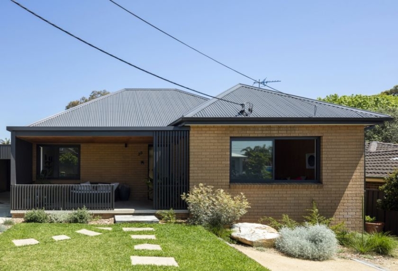 How a Black Metal Extension Turned a 1960s Brick House Into a Light-Filled Modern Home