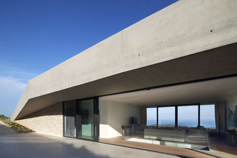 How Architects Built a Modern Family Home Into a Steep Island Hillside