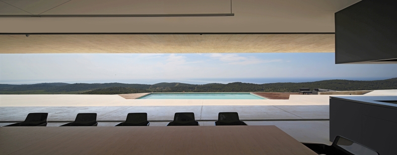 How Architects Built a Modern Family Home Into a Steep Island Hillside