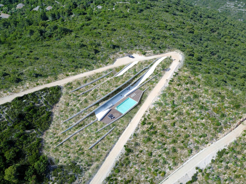 How Architects Built a Modern Family Home Into a Steep Island Hillside