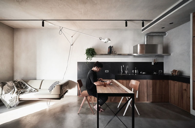 Inside a Compact Apartment With a Loft Bed That Uses Height to Feel Bigger