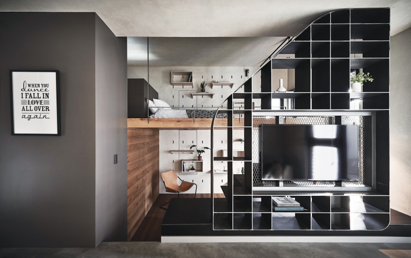 Inside a Compact Apartment With a Loft Bed That Uses Height to Feel Bigger