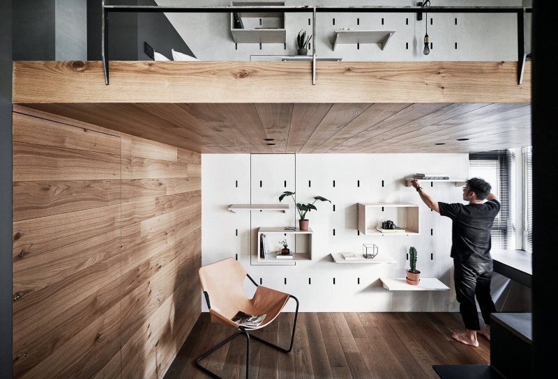 Inside a Compact Apartment With a Loft Bed That Uses Height to Feel Bigger