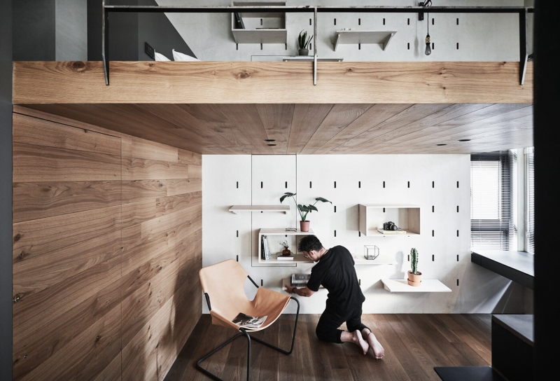 Inside a Compact Apartment With a Loft Bed That Uses Height to Feel Bigger