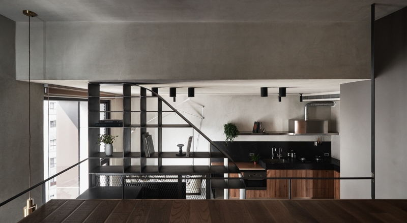 Inside a Compact Apartment With a Loft Bed That Uses Height to Feel Bigger