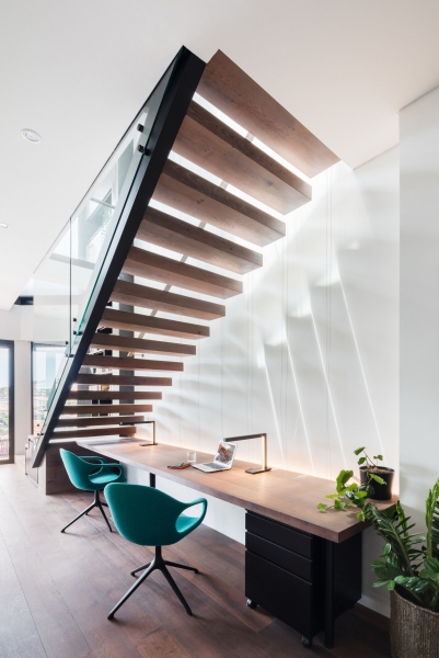 Inside a Home Where Glass Floors Let Light Travel Between Levels