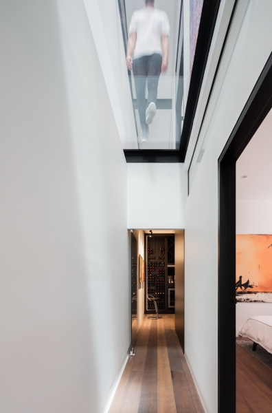 Inside a Home Where Glass Floors Let Light Travel Between Levels