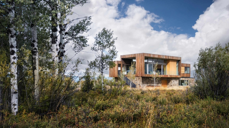 Inside a Mountain Home That Looks Out Over Wetlands and Willow Bushes