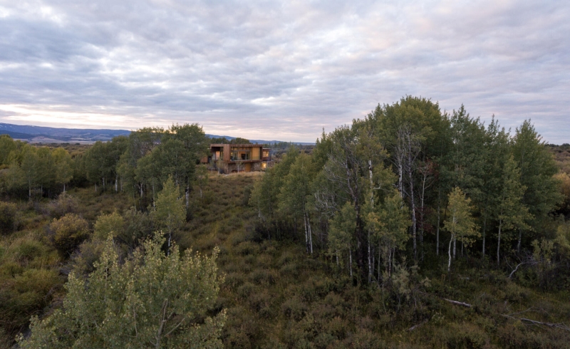 Inside a Mountain Home That Looks Out Over Wetlands and Willow Bushes