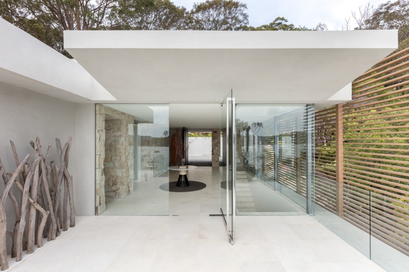 Inside a Multi-Level House That Cascades Down Towards the Water