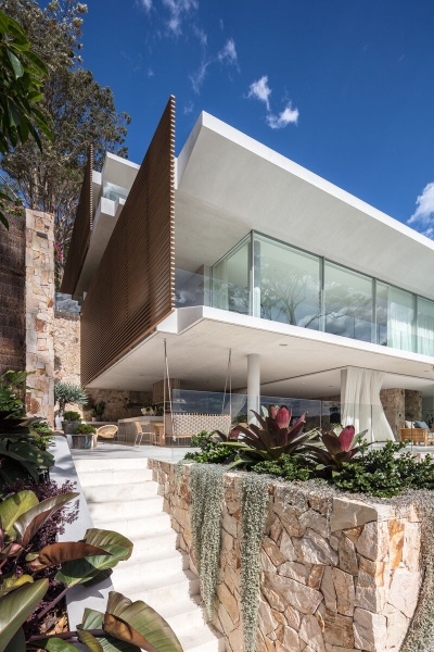 Inside a Multi-Level House That Cascades Down Towards the Water