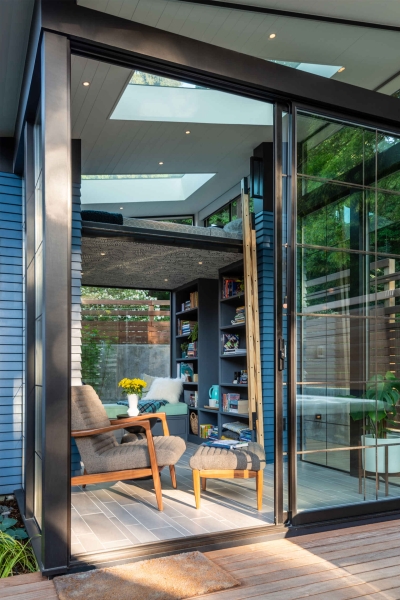 This Backyard Reading Shed Includes a Loft Bed and a Wallpapered Ceiling