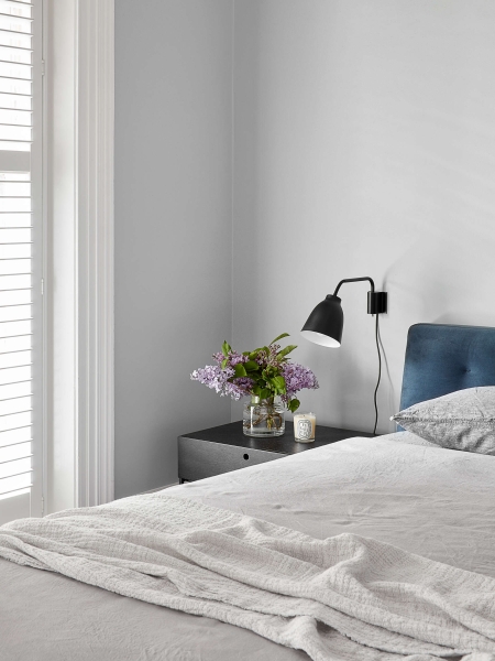 A Bookshelf Wall, a Courtyard and a Surprise Loft Transform this Home