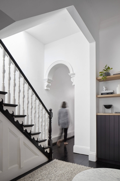 A Bookshelf Wall, a Courtyard and a Surprise Loft Transform this Home