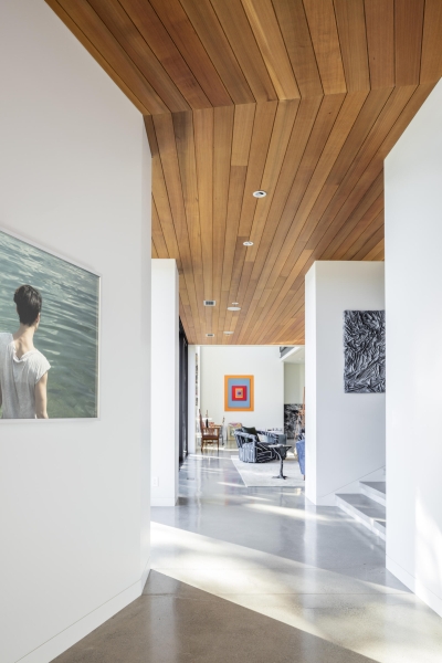 A Boomerang-Shaped Home with an Art Studio and Lake Views