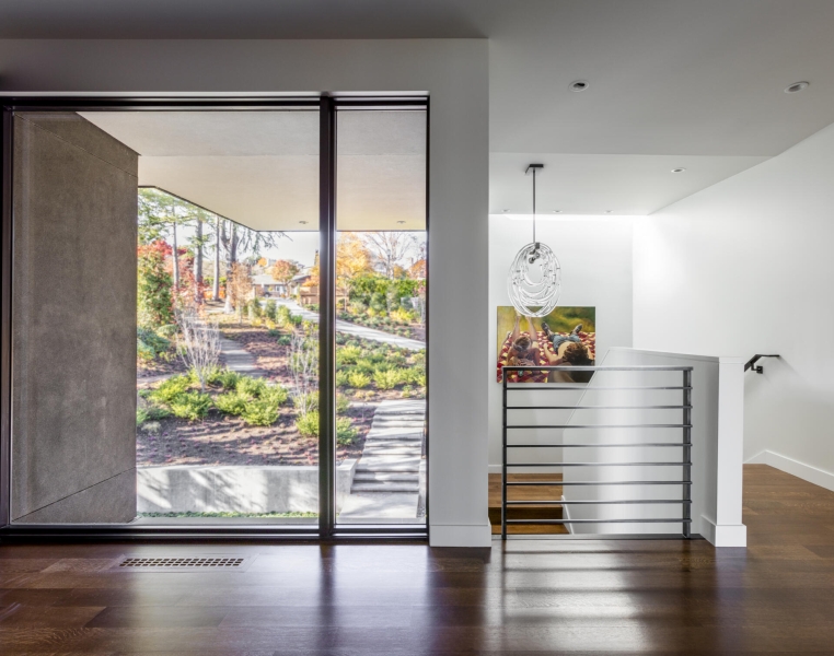 A Boomerang-Shaped Home with an Art Studio and Lake Views