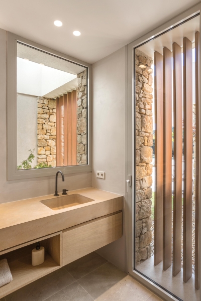 A Mediterranean Stone House Made for Poolside Living