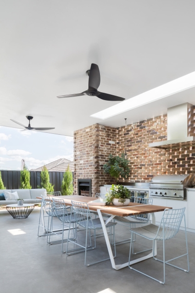 Floor-to-Ceiling Windows, Recycled Brick and a Pool That Ties It All Together