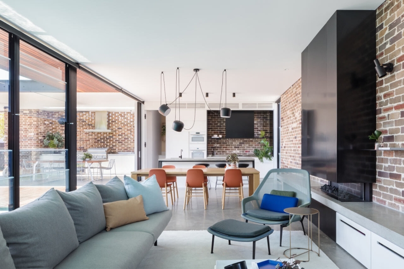 Floor-to-Ceiling Windows, Recycled Brick and a Pool That Ties It All Together