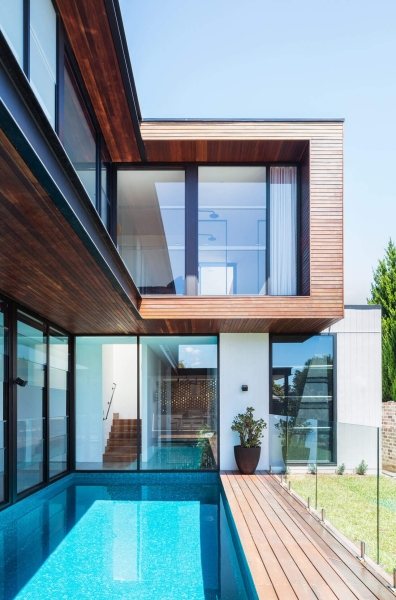 Floor-to-Ceiling Windows, Recycled Brick and a Pool That Ties It All Together