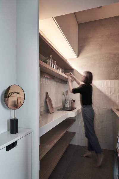 Inside a 189 Square Foot Apartment designed for a Life Between Countries