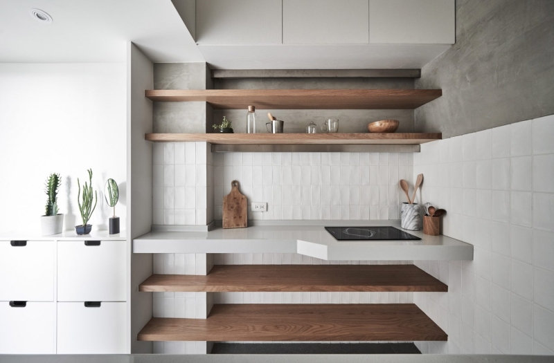 Inside a 189 Square Foot Apartment designed for a Life Between Countries