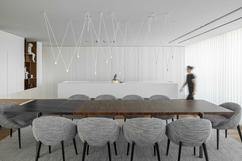 The Modern Home Where Concrete Stripes Shape Both the Exterior and Interior