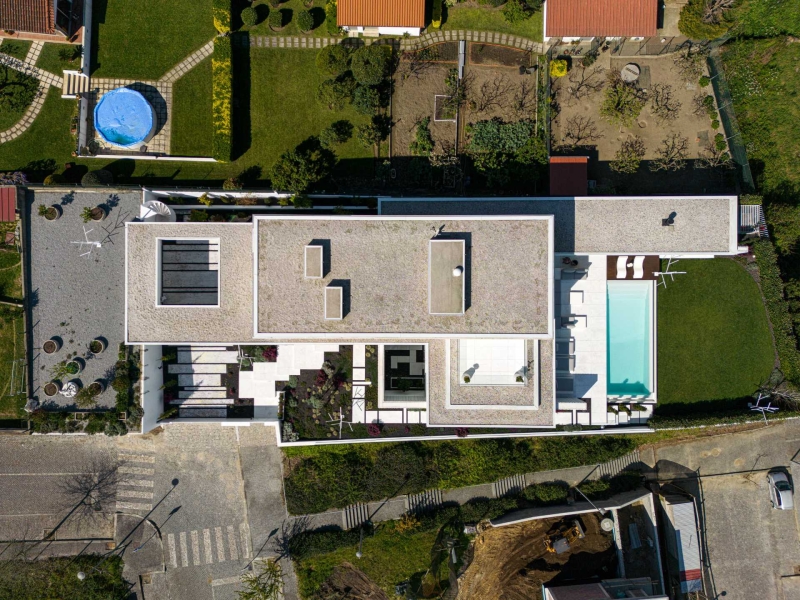 The Modern Home Where Concrete Stripes Shape Both the Exterior and Interior