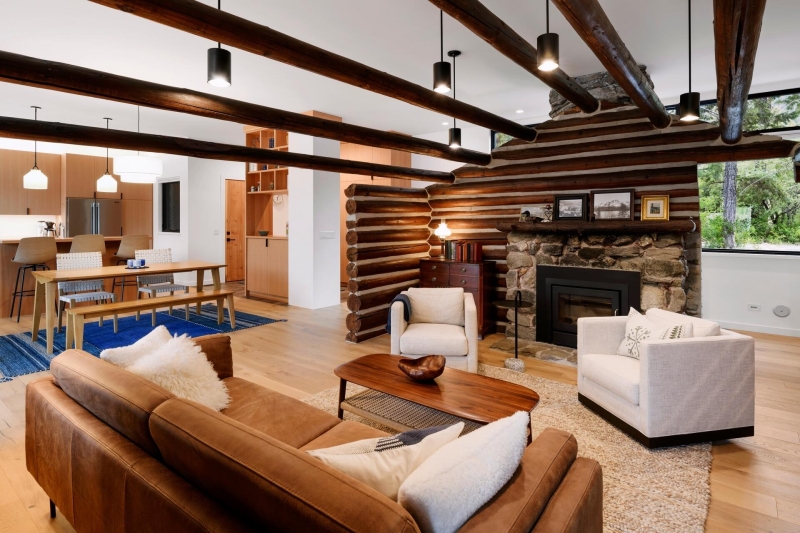 A Century-Old Log Cabin Becomes the Living Room of a New Lake House