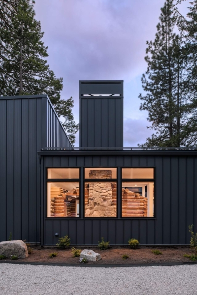 A Century-Old Log Cabin Becomes the Living Room of a New Lake House