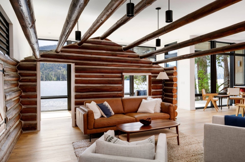 A Century-Old Log Cabin Becomes the Living Room of a New Lake House