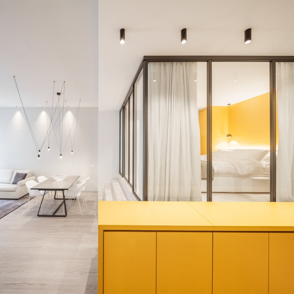 A Small Apartment With Big Ideas, Including a Hidden Kitchen and Raised Bedroom