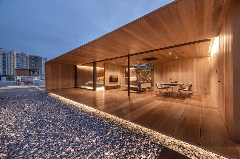 From Water Tanks to a Warm Wooden Home on a Bangkok Rooftop