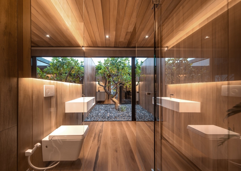 From Water Tanks to a Warm Wooden Home on a Bangkok Rooftop