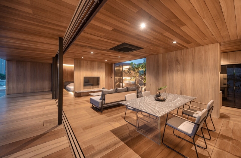 From Water Tanks to a Warm Wooden Home on a Bangkok Rooftop