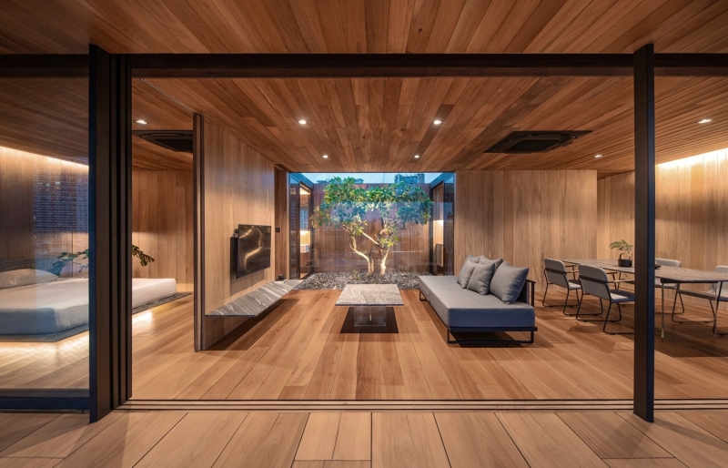 From Water Tanks to a Warm Wooden Home on a Bangkok Rooftop