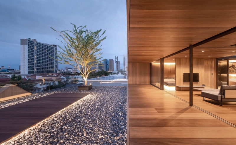 From Water Tanks to a Warm Wooden Home on a Bangkok Rooftop