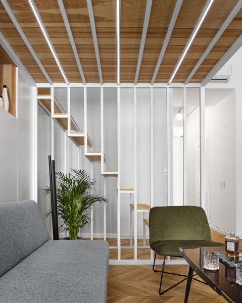 The Budapest Apartment That Uses a Mezzanine to Redefine Space and Privacy