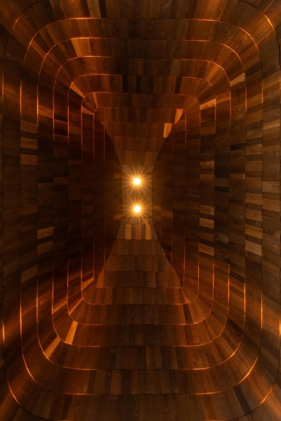 These Glass Guesthouses Turn a Traditional Thatched Roof Into a Sculptural Icon